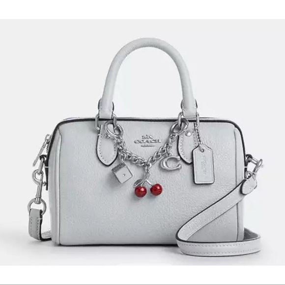 Coach Handbags - Coach Mini Rowan Bag With Charms Ice Blue NWT